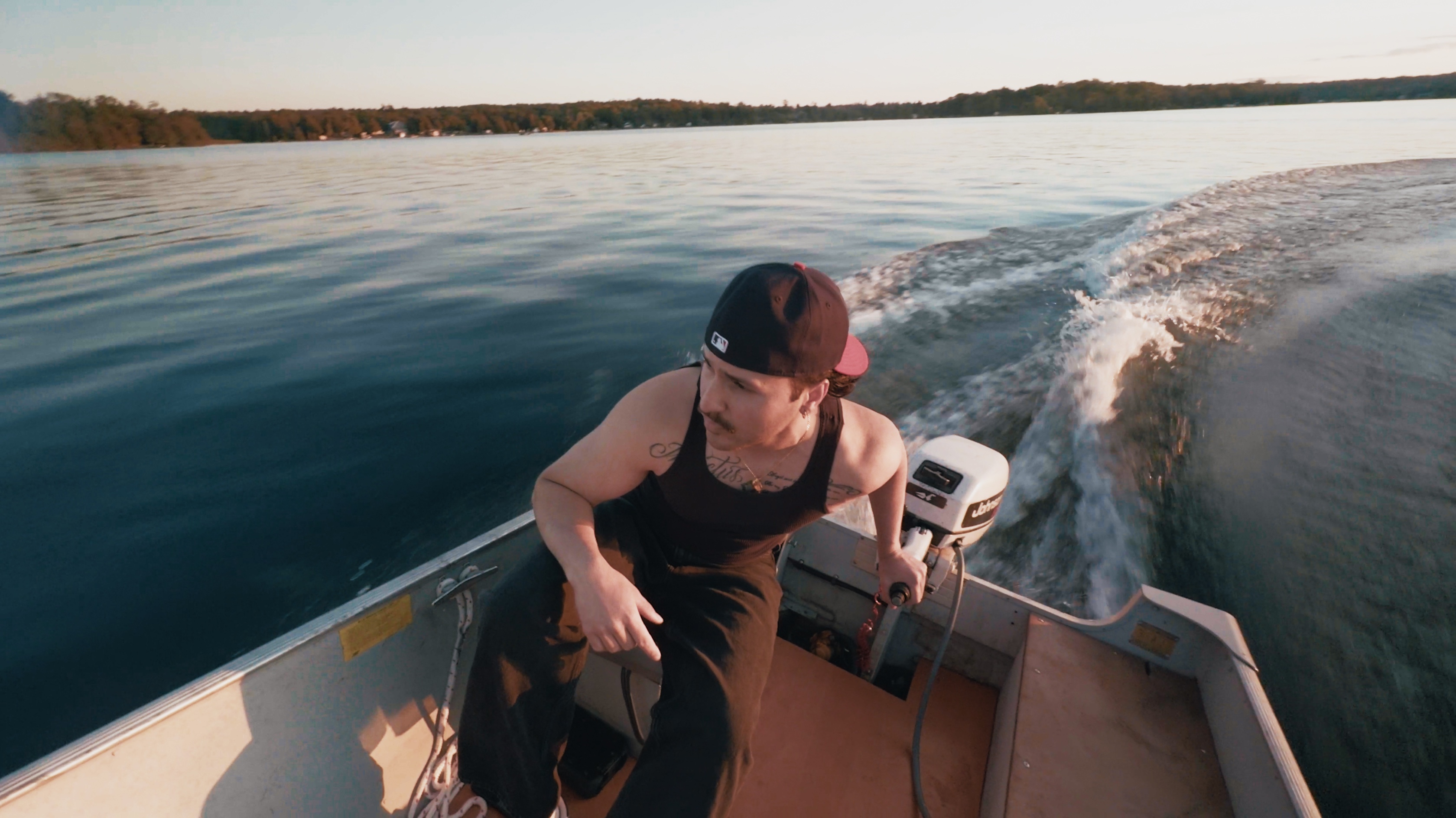 JOZY looking toward the shoreline from a motorboat